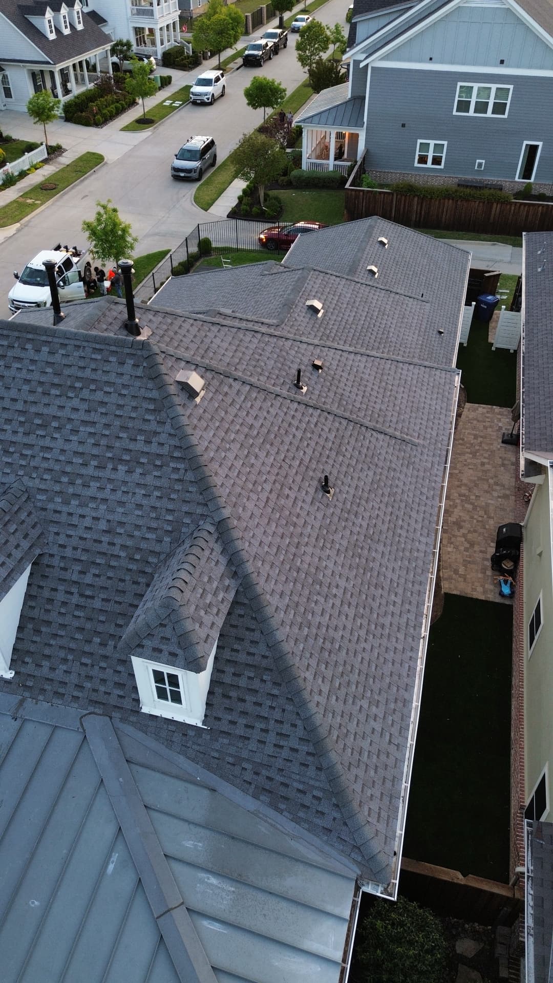 Completed shingle roof and dormer viewed from above