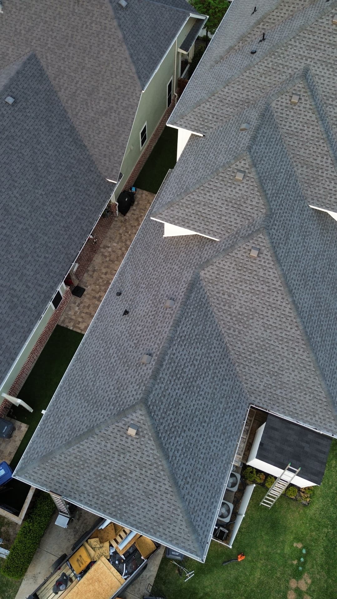 Aerial detail of completed roof shingles, ridges and valleys